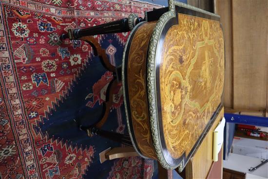 A Louis XVI style marquetry inlaid centre table, with shaped X stretcher W.127cm